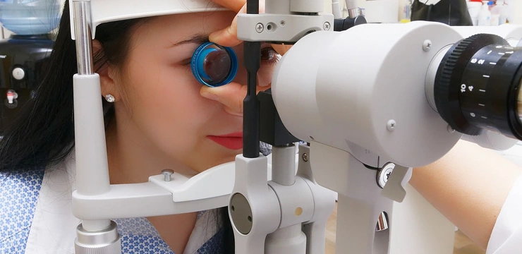 Woman having an eye exam.