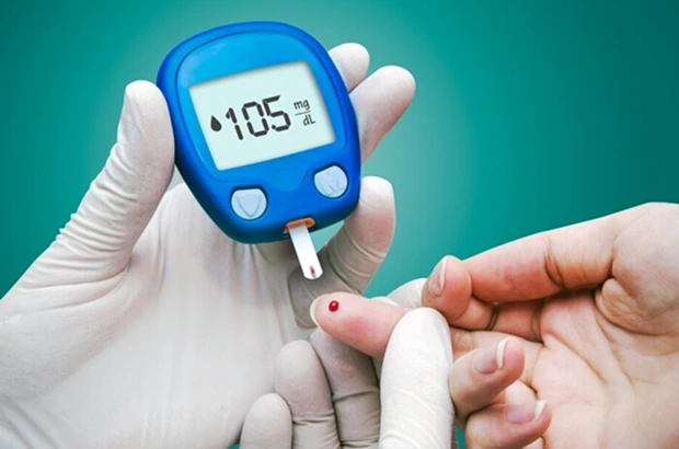  Blood glucose test showing 105 mg/dL on glucometer.